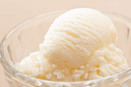 Vanilla Ice cream over a beige backgroundの写真素材