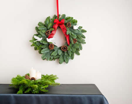 Advent wreath over side board with silver color presentの写真素材