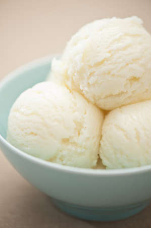Vanilla ice cream over a beige backgroundの写真素材