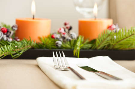 Christmas Dinner table setting in beige orange colorの写真素材