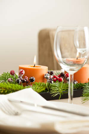 Christmas Dinner table setting in beige orange colorの写真素材