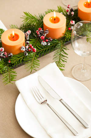 Christmas Dinner table setting in beige orange colorの写真素材