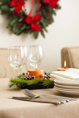 Christmas Dinner table setting in beige orange colorの写真素材