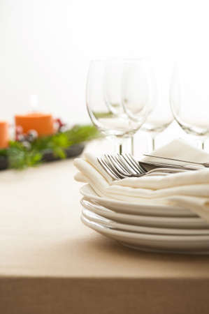 Christmas Dinner table setting in beige orange colorの写真素材