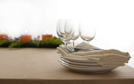 Christmas Dinner table setting in beige orange colorの写真素材