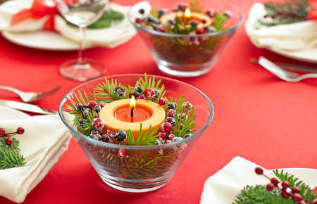 Christmas Dinner table setting with real tree decorationの写真素材
