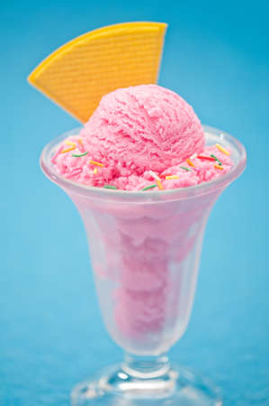 Strawberry ice cream cup with waferの写真素材