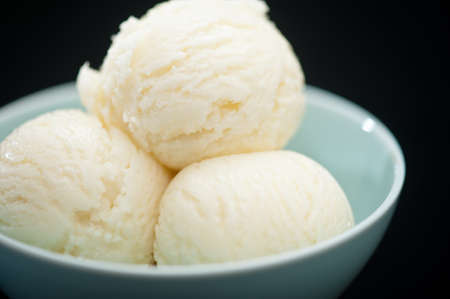 Ice Cream cup isolated over black backgroundの写真素材