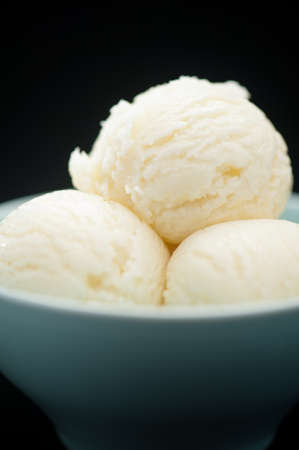 Ice Cream cup isolated over black backgroundの写真素材