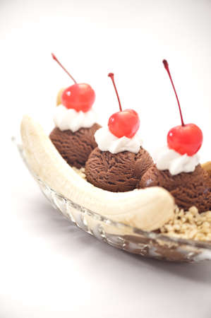 Banana Split Ice Cream isolated over bright backgroundの写真素材