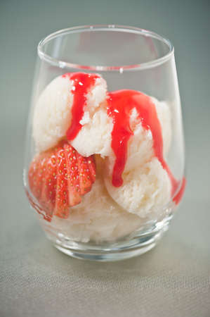 Vanilla ice cream and Strawberries dessert in a glassの写真素材