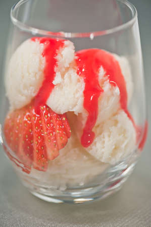 Vanilla ice cream and Strawberries dessert in a glassの写真素材