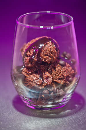 Chocolate ice cream in a glass with chocolate chips
の写真素材