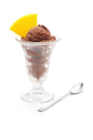 Chocolate ice cream in a glass with with waffle decorationの写真素材