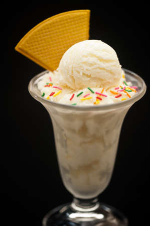 Vanilla ice cream in a tall glassの写真素材