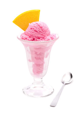 Raspberry ice cream in a tall glassの写真素材