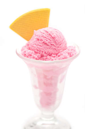 Raspberry ice cream in a tall glassの写真素材