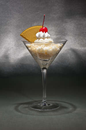 Vanilla ice cream in a Martini glass with with waffle decorationの写真素材