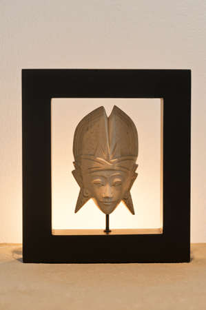 Thai art backlit over side boardの写真素材