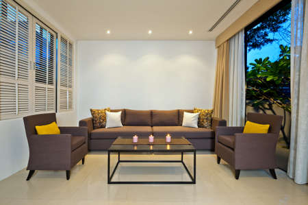 Bright Living room with grey sofa armchair combinationの写真素材