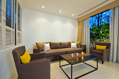 Bright Living room with grey sofa armchair combinationの写真素材