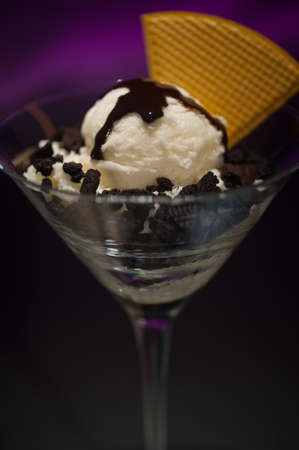 Cookies and ice cream in a Martini glass with with waffle decorationの写真素材