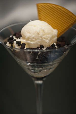 Cookies and ice cream in a Martini glass with with waffle decorationの写真素材