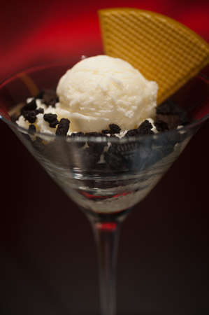 Cookies and ice cream in a Martini glass with with waffle decorationの写真素材