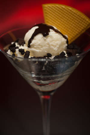 Cookies and ice cream in a Martini glass with with waffle decorationの写真素材