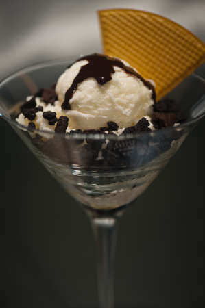 Cookies and ice cream in a Martini glass with with waffle decorationの写真素材