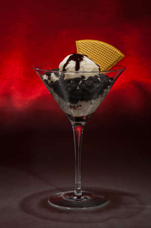 Cookies and ice cream in a Martini glass with with waffle decorationの写真素材