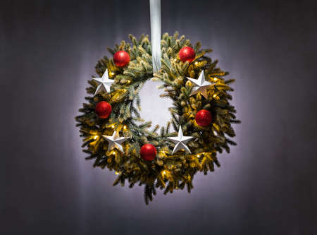 Advent wreath over silver grey background Christmas lightsの写真素材