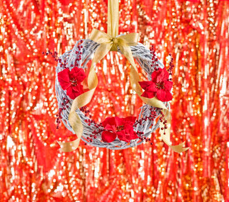 Advents wreath in front of a fiery backgroundの写真素材