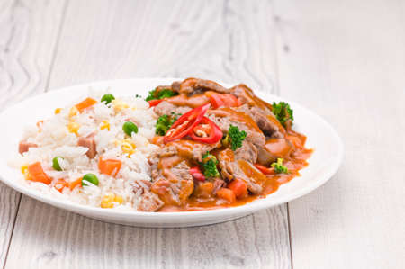 Thai Chili Beef dish over bright surfaceの写真素材