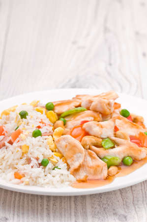 Chicken Cashew Rice dish over bright surfaceの写真素材