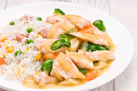 Thai Green Curry dish over bright surfaceの写真素材