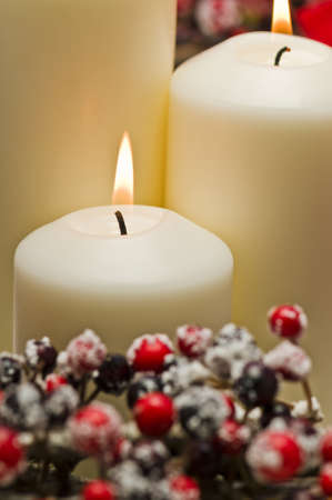 White candles in autumn winter decorationの写真素材