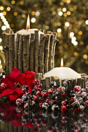Autumn decorated candles in front of a gold backgroundの写真素材