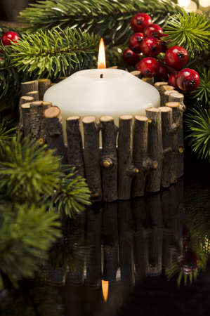 White candle in autumn winter decorationの写真素材