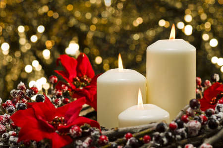 White candles in autumn winter decorationの写真素材
