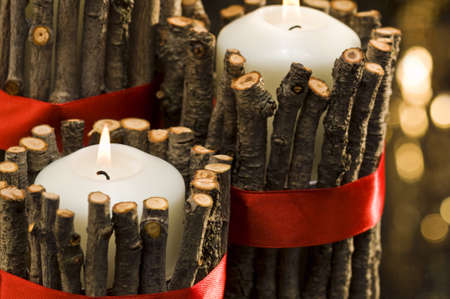 White candles in autumn winter decorationの写真素材