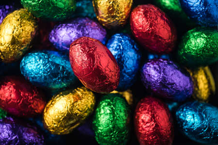 Red, green, purple and blue easter eggs a close upの写真素材