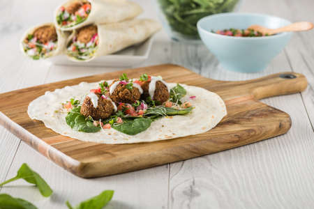 Vegan Falafel Wrap With Salsa and saladの写真素材