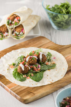 Vegan Falafel Wrap With Salsa and saladの写真素材