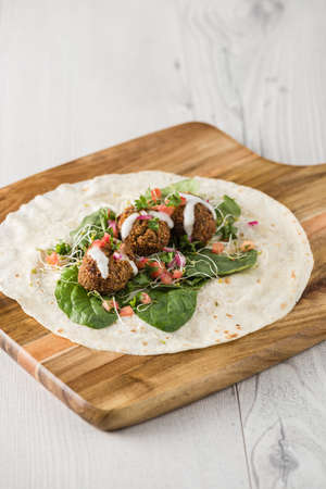 Vegan Falafel Wrap With Salsa and saladの写真素材