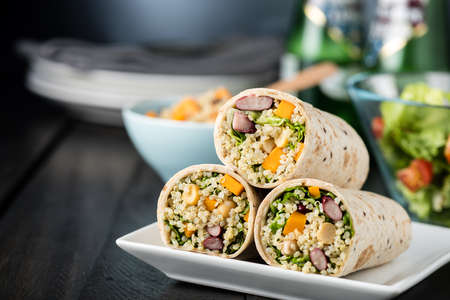 Vegan quinoa wraps with chickpea, kidney beans and pumpkin