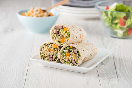Vegan quinoa wraps with chickpea, kidney beans and pumpkinの写真素材