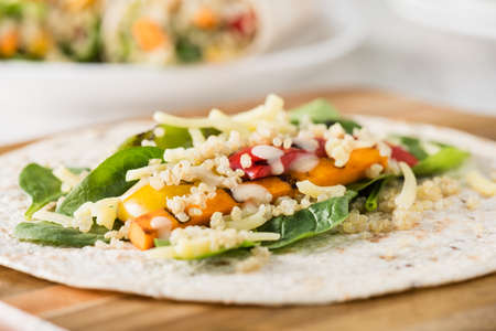 Grilled vegetables warps with quinoa, pumpkin, peppers and cheeseの写真素材