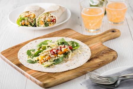 Grilled vegetables warps with quinoa, pumpkin, peppers and cheeseの写真素材