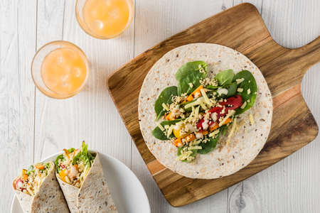 Grilled vegetables warps with quinoa, pumpkin, peppers and cheeseの写真素材